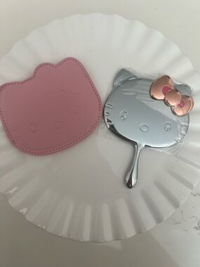 Hello Kitty Pink and Silver Hand Mirror with Pink Bow Accent